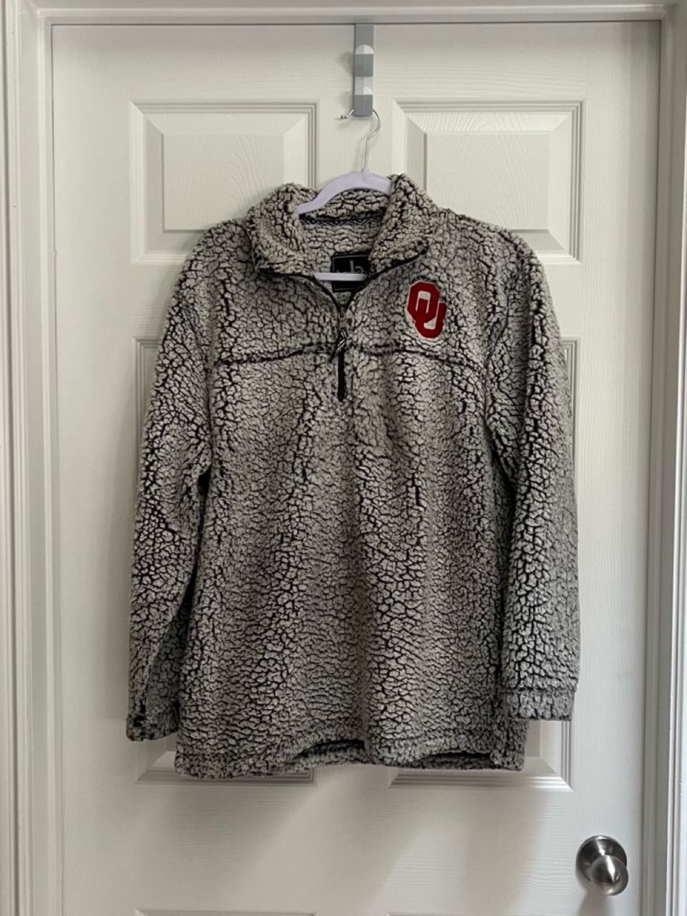 Gray and black Oklahoma Sooners quarter zip fleece with red logo